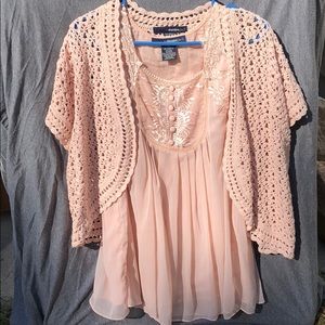 Woman’s tank top and cardigan